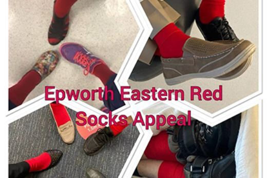 Epworth staff pose for photos of their feet in red socks