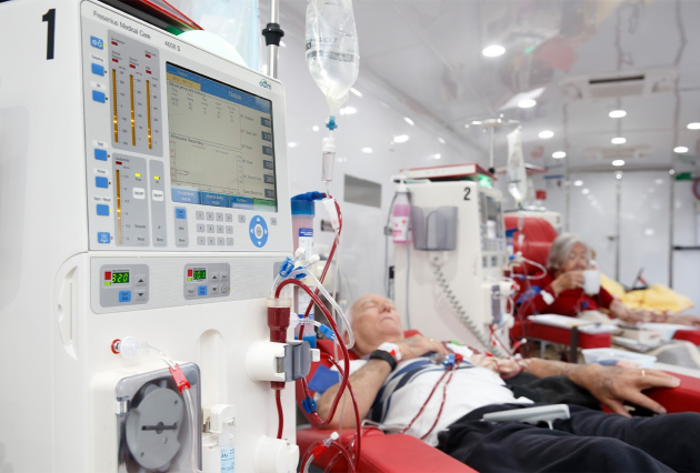 An older man lying down on dialysis