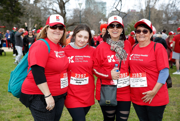 Four Big Red Kidney Walk participants pose
