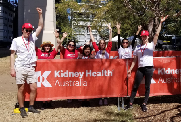 Kidney Health Australia volunteers posing for a photo outside