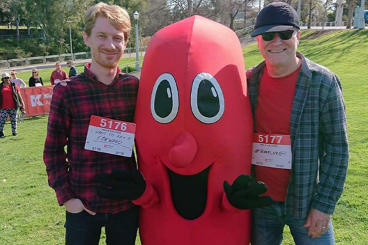 Luke poses with the Kidney Health mascot